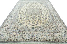Surface texture of 2000s Nain rug with natural Wool and intricate pattern