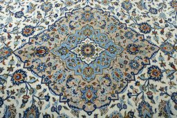 Central medallion detail of 2000s Kashan rug from Iran / Persia
