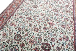 Backside of handmade 1970s Sarough rug showing knot structure and weave density