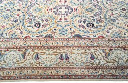 Full view of 1950s Kashan rug from Iran / Persia, 382 × 260 cm in Beige tones