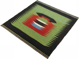 Corner detail of New Kilim Sofre rug showing border pattern and Wool pile