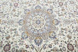 Central medallion detail of 2000s Kashan rug from Iran / Persia