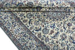 Close-up detail of 2000s Nain rug from Iran / Persia showing Wool weave