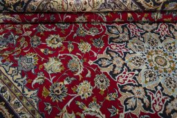 Close-up detail of 2000s Najafabad rug from Iran / Persia showing Wool weave