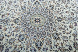 Central medallion detail of 2000s Kashan rug from Iran / Persia