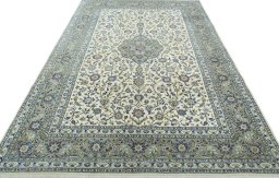 Surface texture of New Kashan rug with natural Cork and intricate pattern