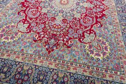 Close-up detail of 1970s Kerman rug from Iran / Persia showing Wool weave