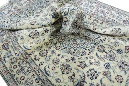 Surface texture of New Nain rug with natural Wool and intricate pattern