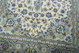 Close-up detail of 2000s Kashan rug from Iran / Persia showing Wool weave