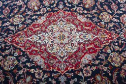 Central medallion detail of 2000s Kashan rug from Iran / Persia