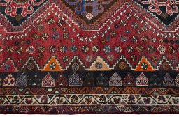 Close-up detail of 2000s Shiraz rug from Iran / Persia showing Wool weave