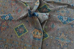 Full view of New Kazak rug from Pakistan, 305 × 252 cm in Brown tones