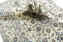 Surface texture of New Kashan rug with natural Wool and intricate pattern