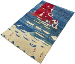 Corner detail of 2000s Persian Gabbeh rug showing border pattern and Wool pile