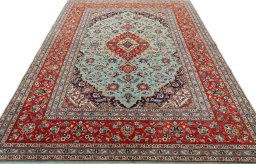 Surface texture of New Kashan rug with natural Cork and intricate pattern