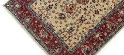 Backside of handmade New Farahan rug showing knot structure and weave density