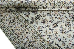 Close-up detail of 2000s Kashan rug from Iran / Persia showing Wool weave