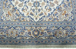 Full view of 2000s Kashan rug from Iran / Persia, 305 × 200 cm in Beige tones