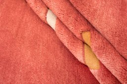 Corner detail of New Kilim Gabbeh rug showing border pattern and Wool pile