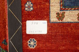 Corner detail of New Persian Gabbeh rug showing border pattern and Wool pile