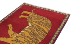 Surface texture of 1980s Persian Gabbeh rug with natural Wool and intricate pattern
