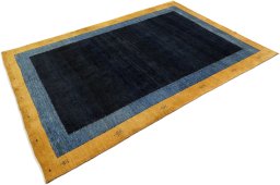 Corner detail of New Persian Gabbeh rug showing border pattern and Wool pile