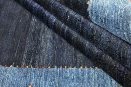 Close-up detail of New Persian Gabbeh rug from Iran / Persia showing Wool weave