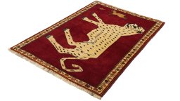 Corner detail of 1970s Persian Gabbeh rug showing border pattern and Wool pile