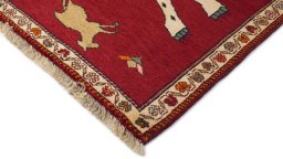 Backside of handmade 1970s Persian Gabbeh rug showing knot structure and weave density