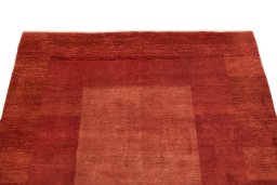 Surface texture of 1990s Persian Gabbeh rug with natural Wool and intricate pattern