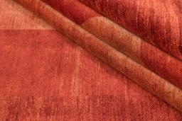 Backside of handmade 1990s Persian Gabbeh rug showing knot structure and weave density