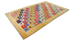 Corner detail of New Persian Gabbeh rug showing border pattern and Wool pile