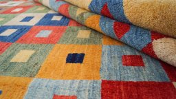 Close-up detail of New Persian Gabbeh rug from Iran / Persia showing Wool weave