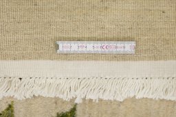 Full view of New Persian Gabbeh rug from Iran / Persia, 292 × 189 cm in Cream tones