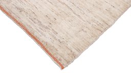 Backside of handmade New Persian Gabbeh rug showing knot structure and weave density