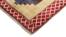 Backside of handmade 1920s Persian Gabbeh rug showing knot structure and weave density