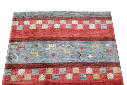 Surface texture of New Gabbeh Loribaft rug with natural Wool and intricate pattern