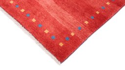 Backside of handmade New Persian Gabbeh rug showing knot structure and weave density