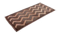Corner detail of New Persian Gabbeh rug showing border pattern and Wool pile