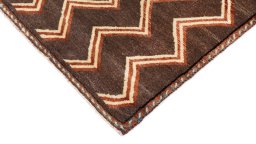 Backside of handmade New Persian Gabbeh rug showing knot structure and weave density
