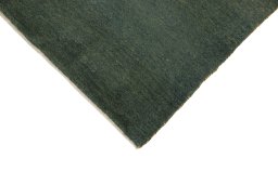 Backside of handmade New Persian Gabbeh rug showing knot structure and weave density