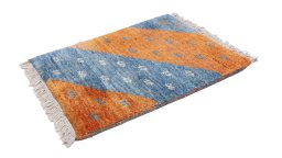 Corner detail of New Persian Gabbeh rug showing border pattern and Wool pile