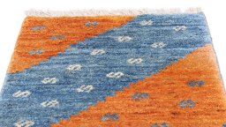 Surface texture of New Persian Gabbeh rug with natural Wool and intricate pattern