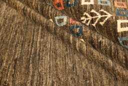 Close-up detail of 1980s Persian Gabbeh rug from Afghanistan showing Wool weave