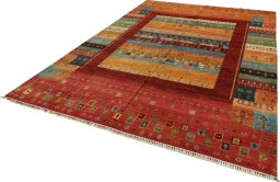 Corner detail of New Persian Gabbeh rug showing border pattern and Wool pile