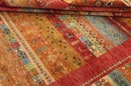 Surface texture of New Persian Gabbeh rug with natural Wool and intricate pattern