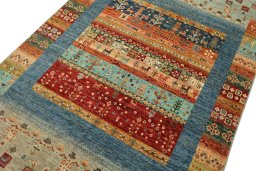 Backside of handmade New Persian Gabbeh rug showing knot structure and weave density