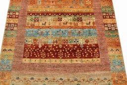 Backside of handmade New Persian Gabbeh rug showing knot structure and weave density