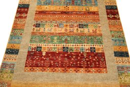 Backside of handmade New Persian Gabbeh rug showing knot structure and weave density