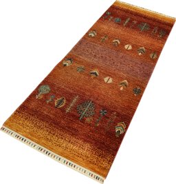 Corner detail of New Persian Gabbeh rug showing border pattern and Wool pile